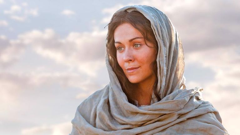 Mary in a blue-gray head covering in the Church Bible video.