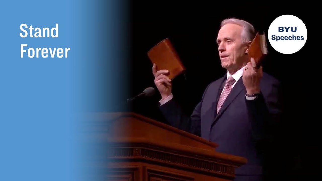 Elder Lawrence E. Corbridge holding scriptures during Stand Forever: official BYU Speeches thumbnail