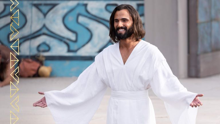 Jesus Christ with open arms in an official Book of Mormon video scene